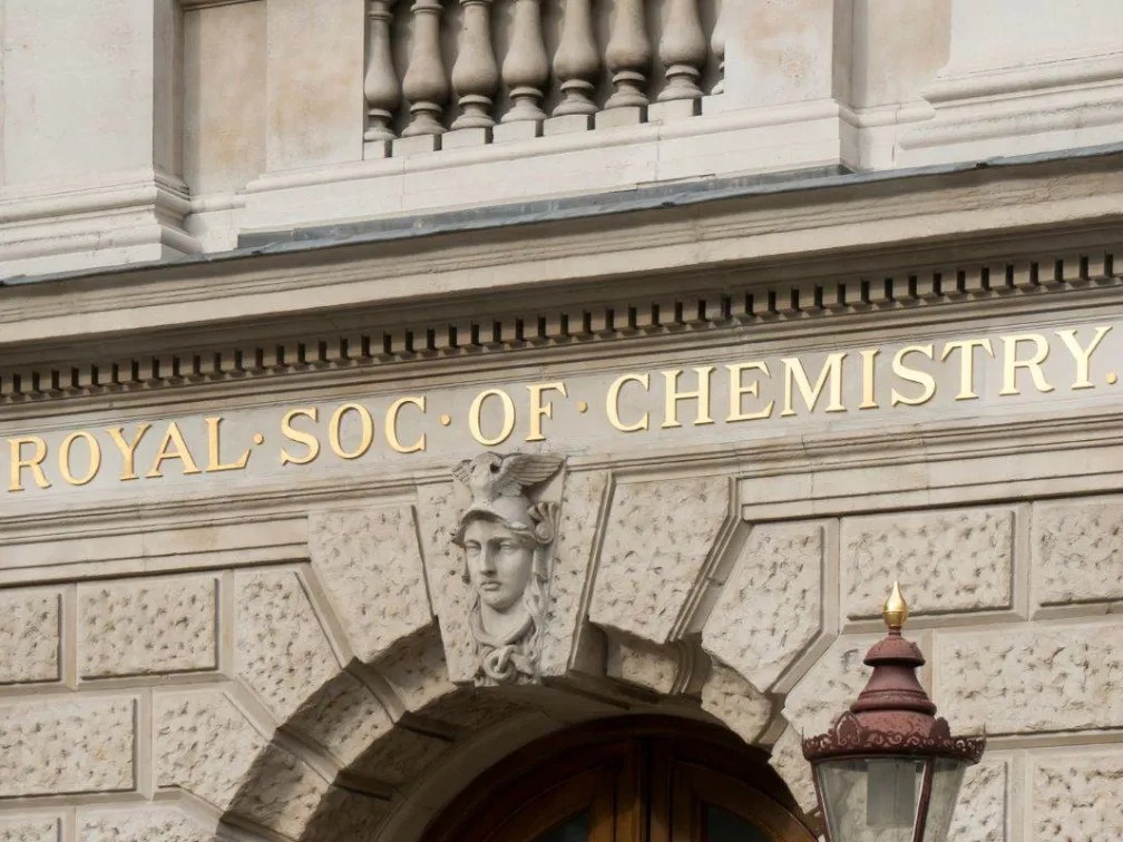 A stone archway with Royal Soc of Chemistry in gold