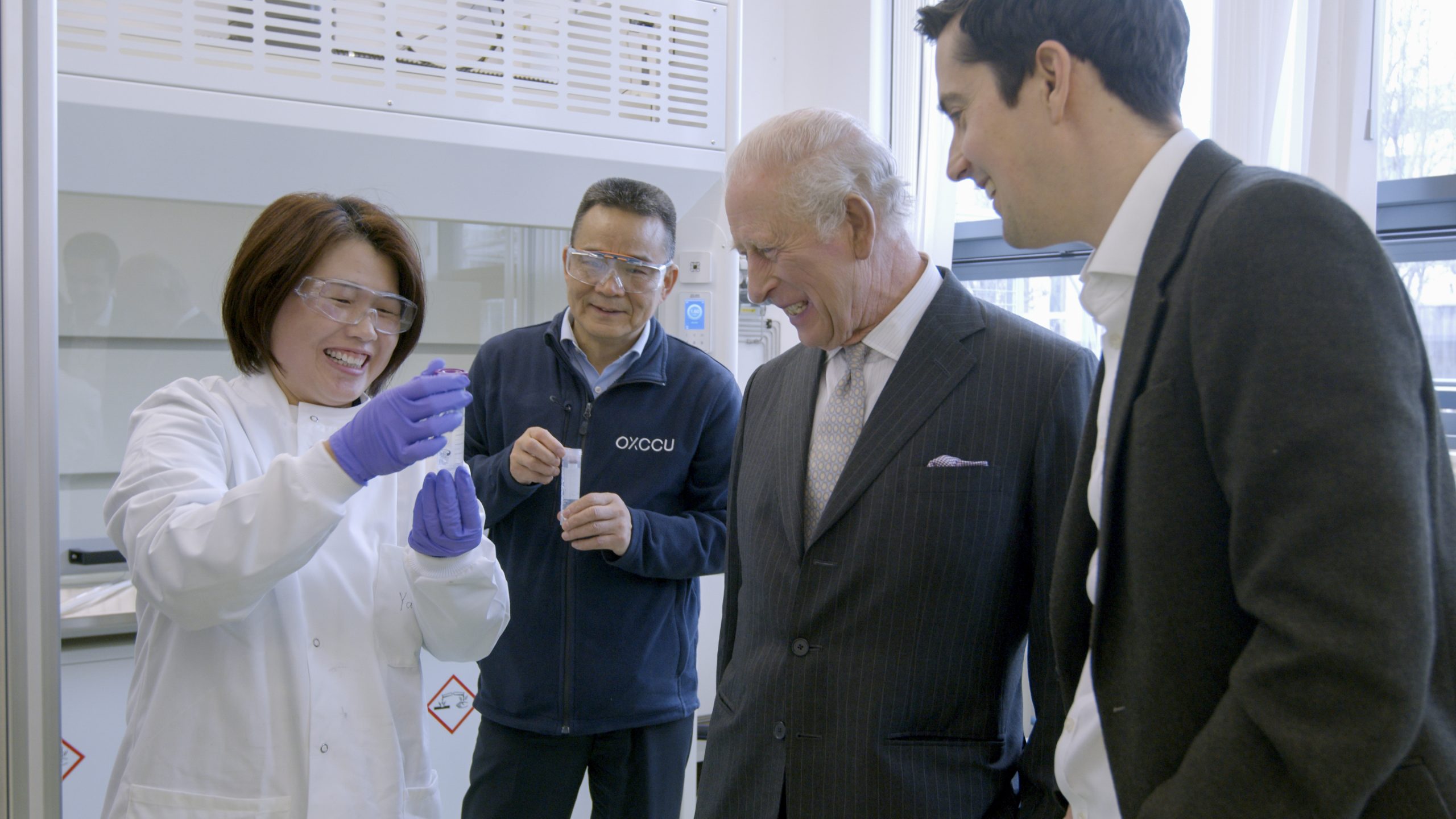 King Charles III meeting with a group of OXCCU employees