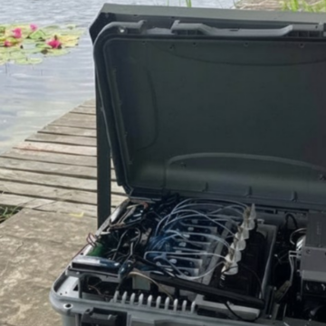 The CERES autonomous monitoring technology next to a river
